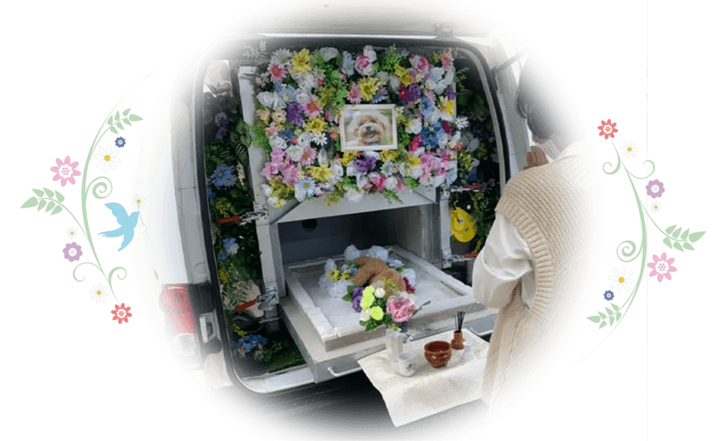 火葬車での合掌